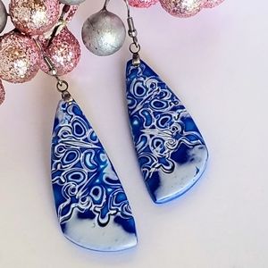 Blue on white earrings with French hooks.